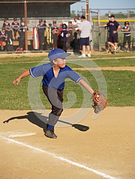 Little league baseball first baseman photo