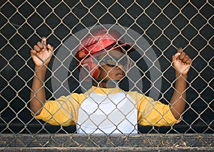 Little League Baseball Player in the Dugout 3