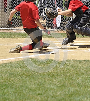 Little league play at homeplate