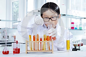 Little learner try to make chemical experiment