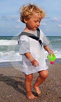 Little mariner on the beach