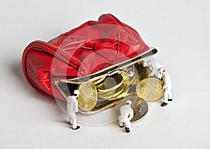 Little men to add Russian coins to the open red wallet