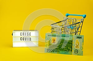Little metallic cart, a new serie of angloan money/banknote and a sign of crise covid photo