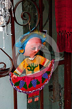 Little Mexican dolls in traditional dress at the Souvenir shop, popular place for the tourists who visit the country