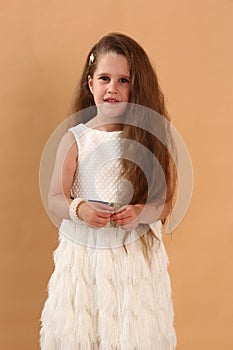 little model girl with long brown hair in designer white dress with belt, military boots full body photo walking.
