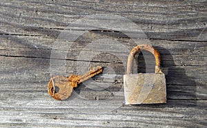 Little old rusty padlock with key