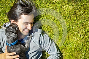 Little Pet Dog and His Owner Having Fun Outdoors