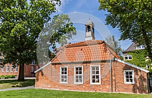 Little Pingelhus building in the historical center of Aurich photo