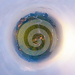 Little planet 360 degree sphere. Panorama of aerial top view of Samet Nangshe and tropical green forest trees at sunset with