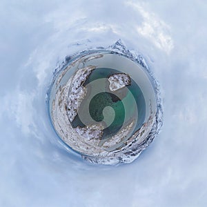 Little planet 360 degree sphere. Panorama of aerial view of white snow mountain in Lofoten islands, Nordland county, Norway,