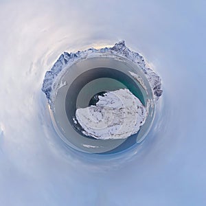 Little planet 360 degree sphere. Panorama of aerial view of white snow mountain in Lofoten islands, Nordland county, Norway,