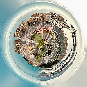 Little planet 360 degree sphere. Panoramic view of Malaga bullring La Malagueta and seaport