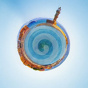 Little planet panorama of Chania Crete Greece with beautiful lighthouse at fantasy sunrise.