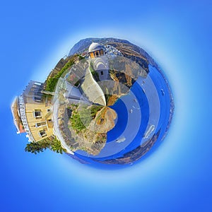 Little planet panorama of Thira Santorini Greece at fantasy sunrise. Vintage colored picture.
