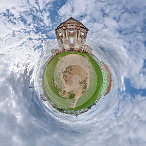 little planet and spherical aerial 360 panorama view on street ancient medieval castle with church and historic buildings with