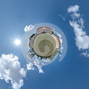 little planet and spherical aerial 360 panorama view on street ancient medieval castle with church and historic buildings with