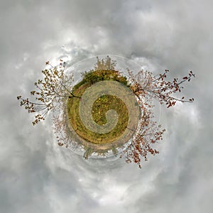 Little planet spherical panorama 360 degrees. Spherical aerial view  in autumn apple garden orchard. Curvature of space