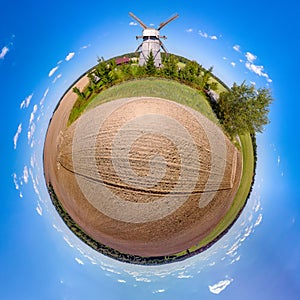 Little planet thw windmill Dudutki, Belarus photo