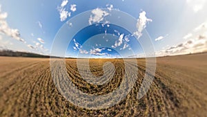 Little planet Transformation with curvature of space. Abstract rotate, torsion and spinning of full flyby panorama among fields in