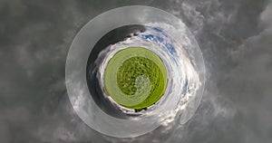 Little planet Transformation with curvature of space. Abstract rotate, torsion and spinning of full flyby panorama among fields wi