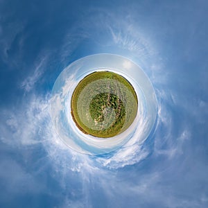 Little planet transformation of spherical panorama 360 degrees. Spherical abstract aerial view in field with awesome beautiful