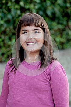 Little preteen girl in park