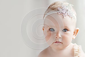 Little pretty girl with blue eyes.  Close up picture. Copy space