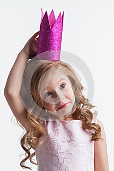Little princess girl in pink dress