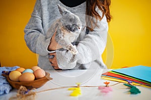 Little rabbit with a basket with decorated egg - Easter card