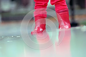 Little red boots in the rain