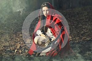 Little red riding hood waiting the prey