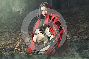 Little red riding hood waiting the prey photo