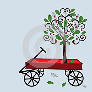 Little red wagon with tree