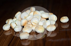 Little round bread on tables. Space.