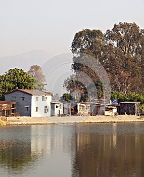 Little rural houses over water, Nam Sang Wai, HK photo
