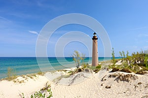 Little Sable Point Lighthouse in dunes, built in 1867 photo