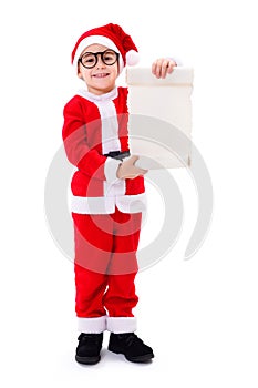 Little Santa Claus boy showing wishlist