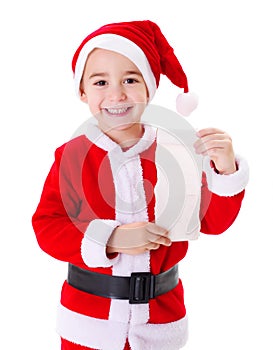 Little Santa Claus boy showing wishlist photo