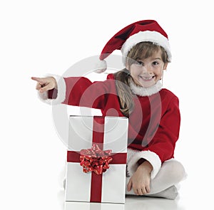 A little santa claus girl that indicates photo