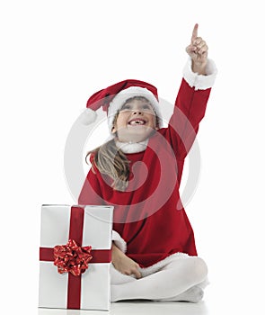 A little santa claus girl that indicates