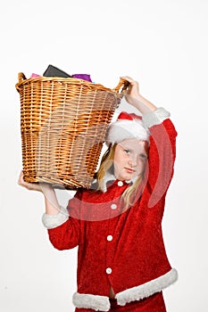 Little santa claus holding a basket