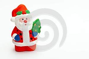 Little Santa Claus toy isolated on white background. christmas and new year concept