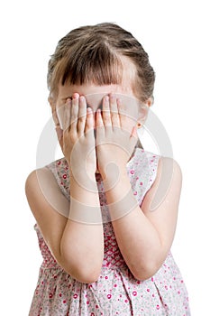 Little scared or crying or playing bo-peep kid hiding face