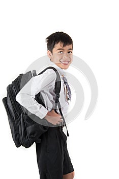 Little school boy wearing student uniform ready for first day