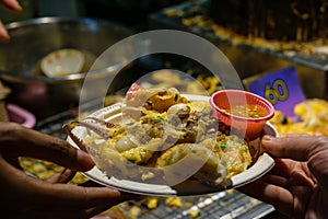 Little seafood omeletes from traditional food market and bazar in Thailand