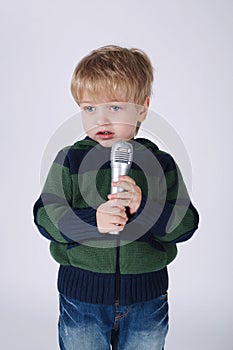 Little singing boy with mic