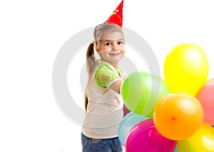 Little smiling girl celebrating birthday with multicolor ballons