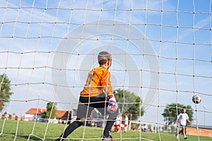 Little soccer goalkeeper