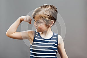 Little Sportive Tough Boy, Showing his Muscles