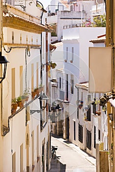 Little street of the historic city center Sitges, Barcelona, Catalunya, Spain. Vertical.